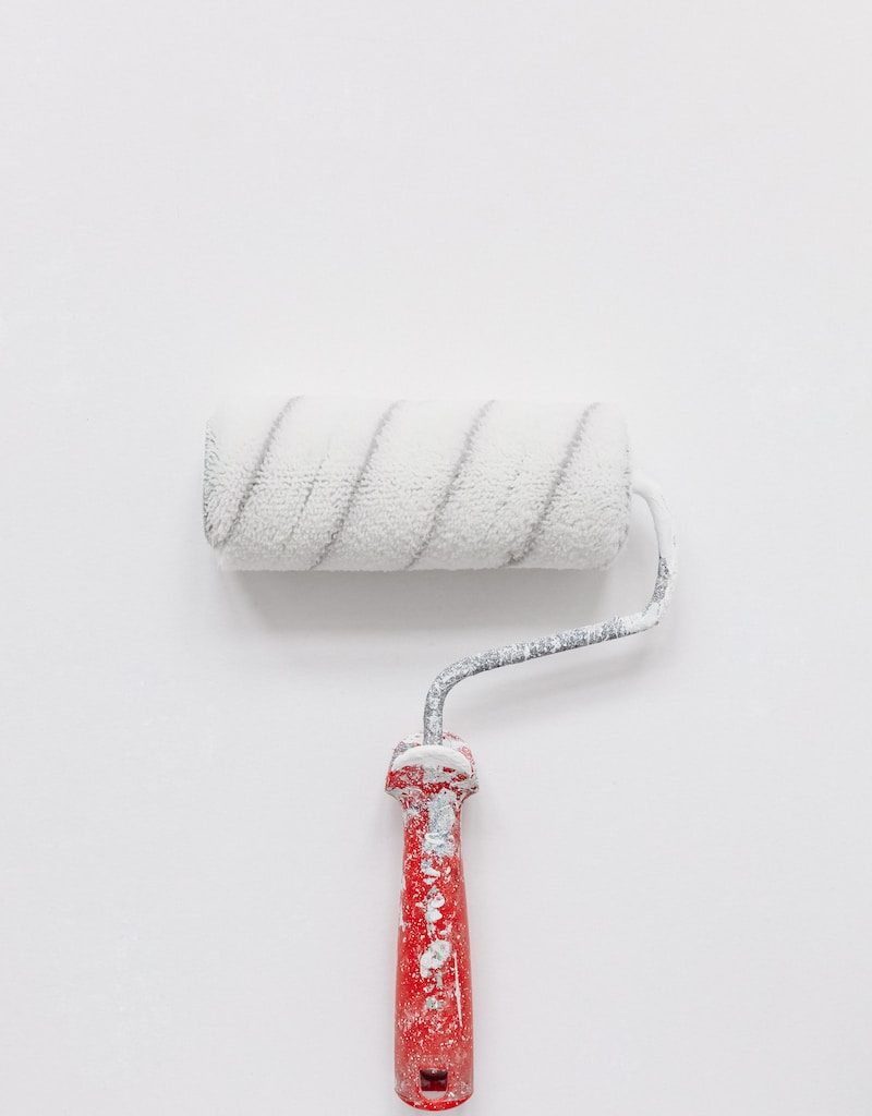 white paint roller