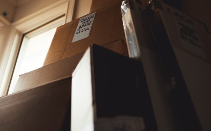 boxes leaning on cardboard box