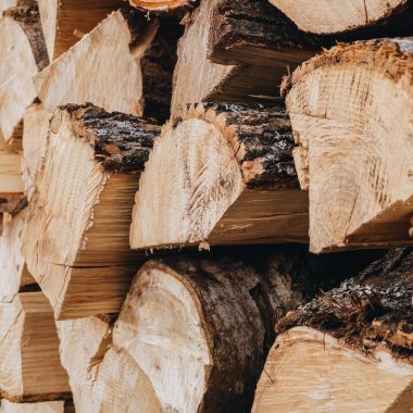 brown wood logs in close up photography