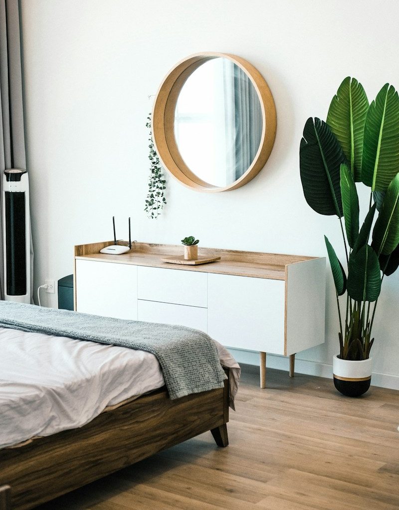 white wooden dresser with mirror