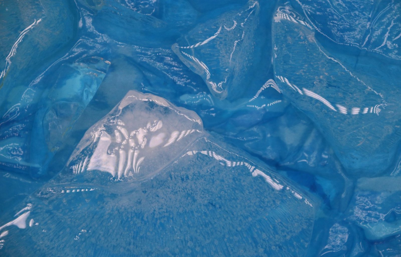 high-angle photography of white and blue ocean waves