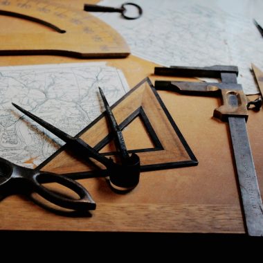 drafting instruments on top of table