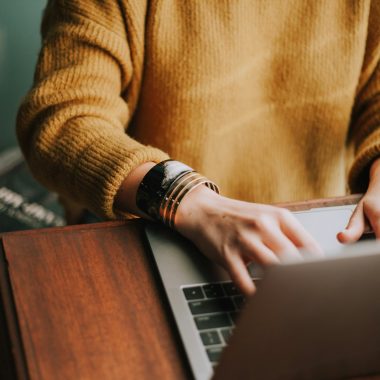 person using laptop computer