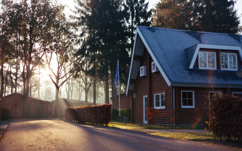 brown and red house near trees