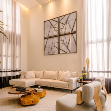 a living room with a couch a chair and a table