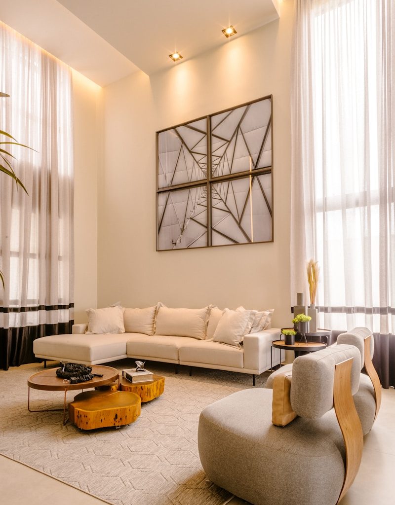 a living room with a couch a chair and a table