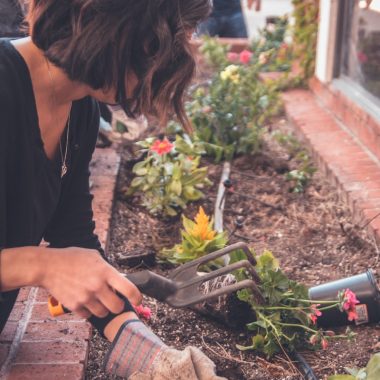 woman holding garden fork