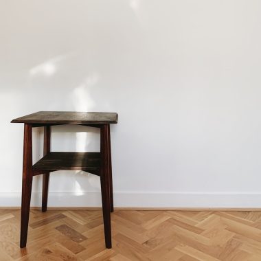 brown wooden seat on brown wooden parquet floor