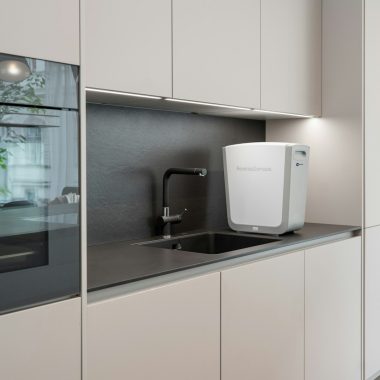 a kitchen with white cabinets