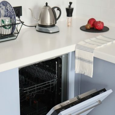 stainless steel kettle on white kitchen counter