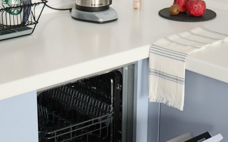 stainless steel kettle on white kitchen counter