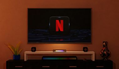 a flat screen tv sitting on top of a entertainment center