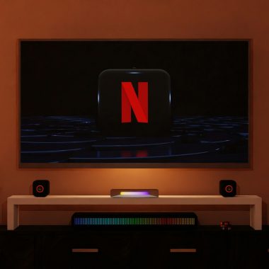 a flat screen tv sitting on top of a entertainment center