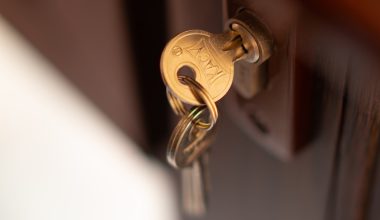 a close up of a key on a door