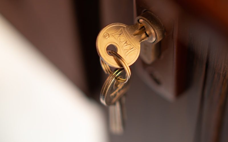 a close up of a key on a door