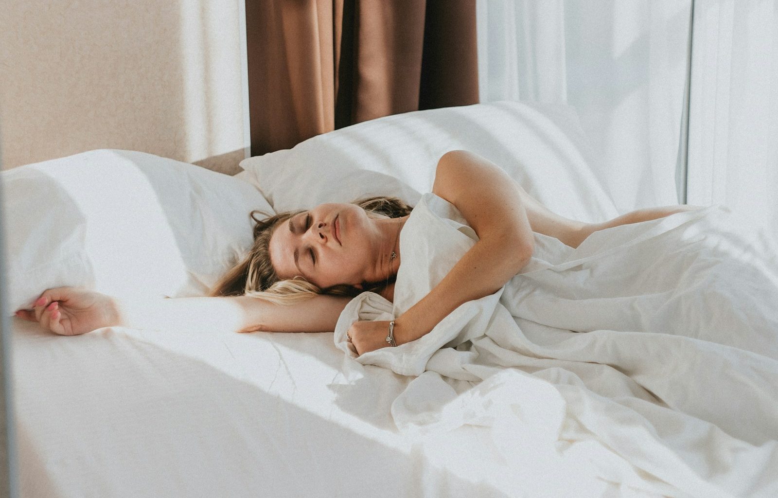 a person lying in a bed