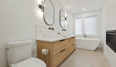 white ceramic sink with stainless steel faucet