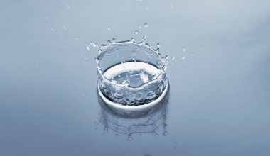 a glass of water with ice