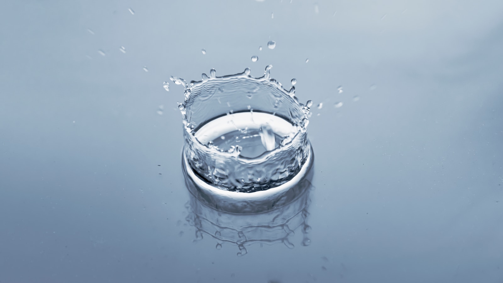 a glass of water with ice