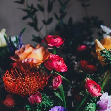 assorted petaled flowers centerpiece inside room