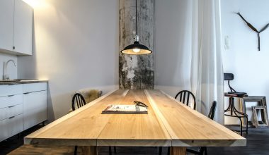 brown wooden table with chairs